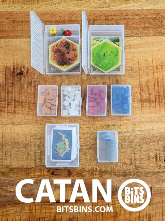 Catan resource cards organized in BitsBins Tarot containers on the table