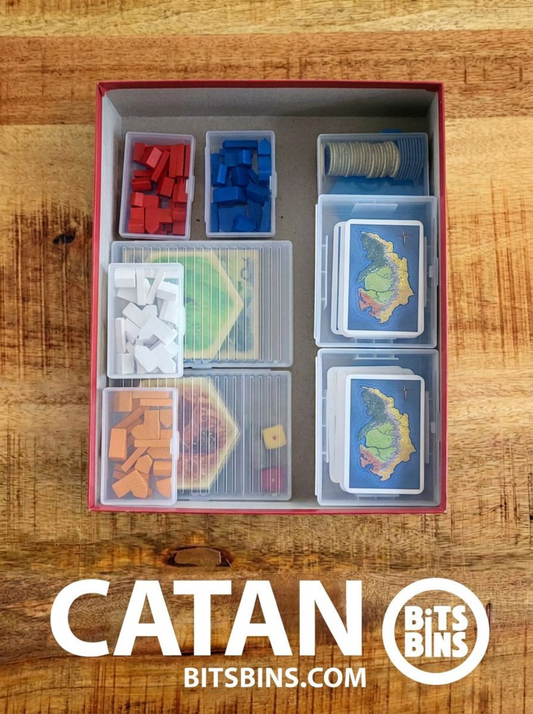 Catan roads, settlements and cities sorted by color in BitsBins inside the game box