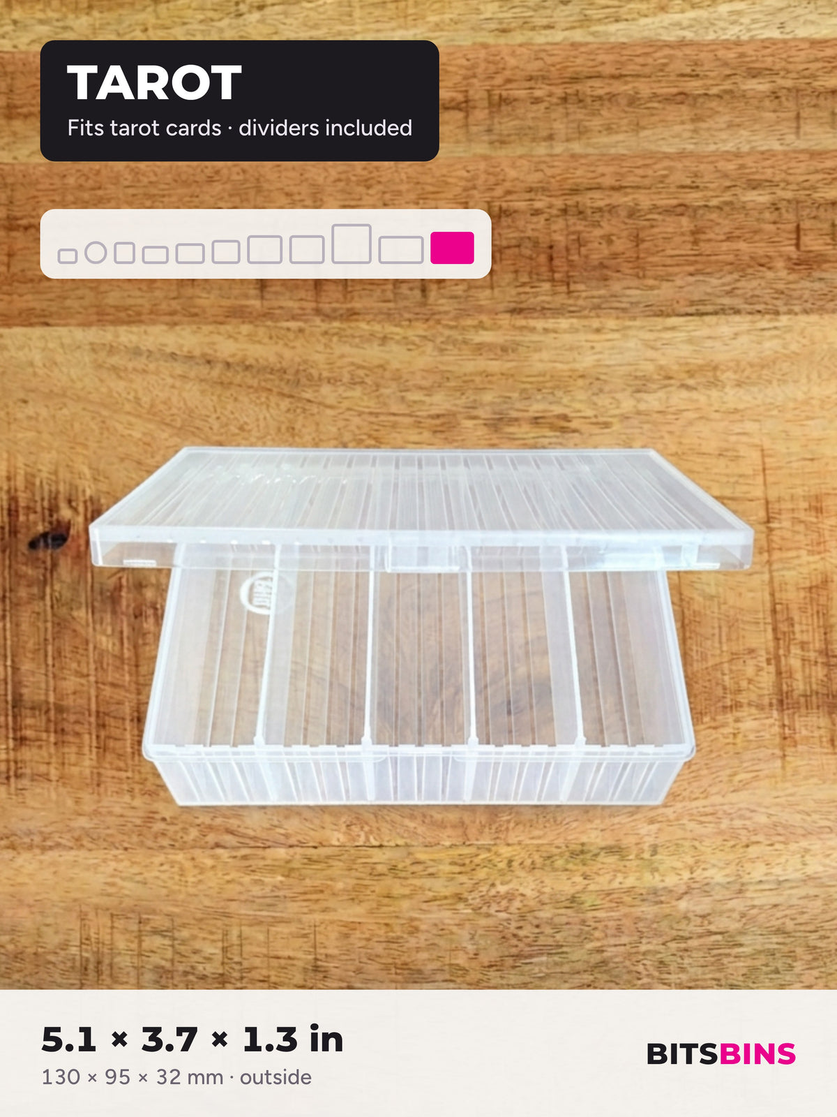 Single BitsBins Tarot container on a wood table with the lid open, showing the dividers. Fits tarot cards up to 80 x 120 mm. 5.1 x 3.7 x 1.3 in (130 x 95 x 32 mm).